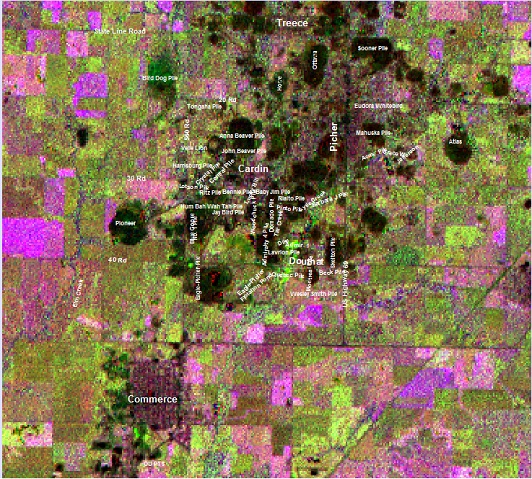 Landsat Composites of band ratios 4/3-3/1-5/7 for December 9, 1988 and December 6, 2010, 2010 image is a rollover image.